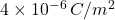 4\times10^{-6}\,C/m^2